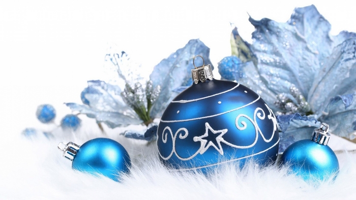Blue Christmas ornaments and poinsettias