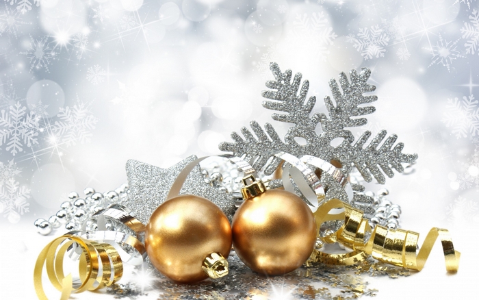 Christmas ornaments with snowflakes and ribbons