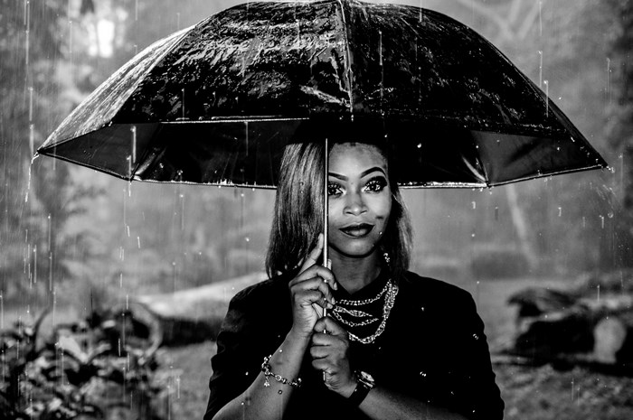 Woman holding an umbrella in the rain