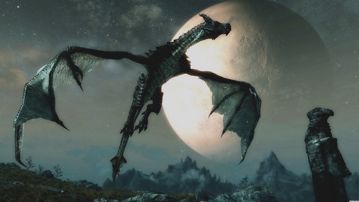 Dragon flying in front of a large moon