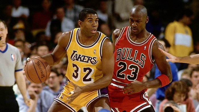 Magic Johnson and Michael Jordan playing basketball