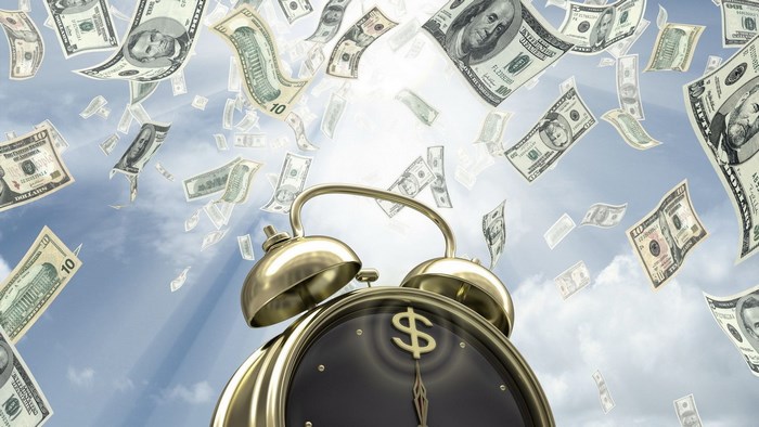 Alarm Clock with Money Falling from the Sky