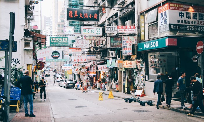 Street scene with shops and signs in Hong Kong
