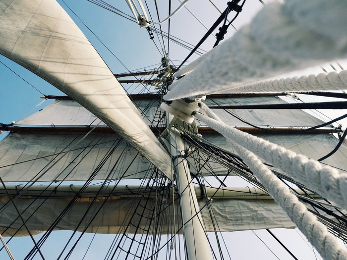 Looking up at the sails and rigging of a tall ship