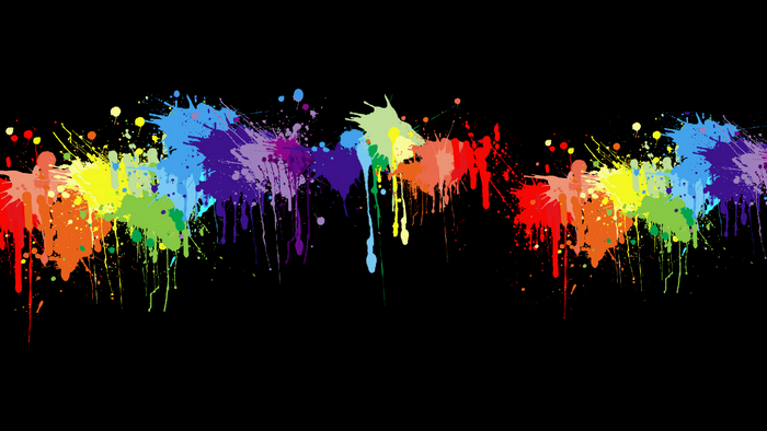 Rainbow paint splatters on black background
