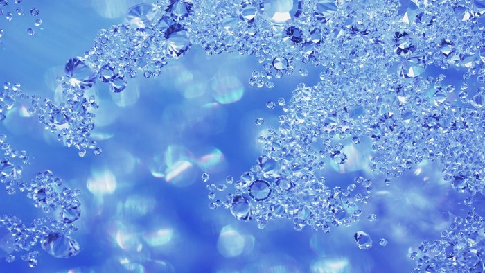Scattered diamonds on a blue bokeh background