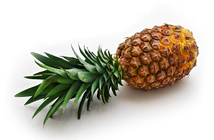 Pineapple with green leaves