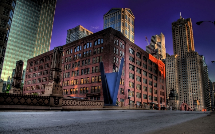 Chicago architecture with blue sculpture at sunset