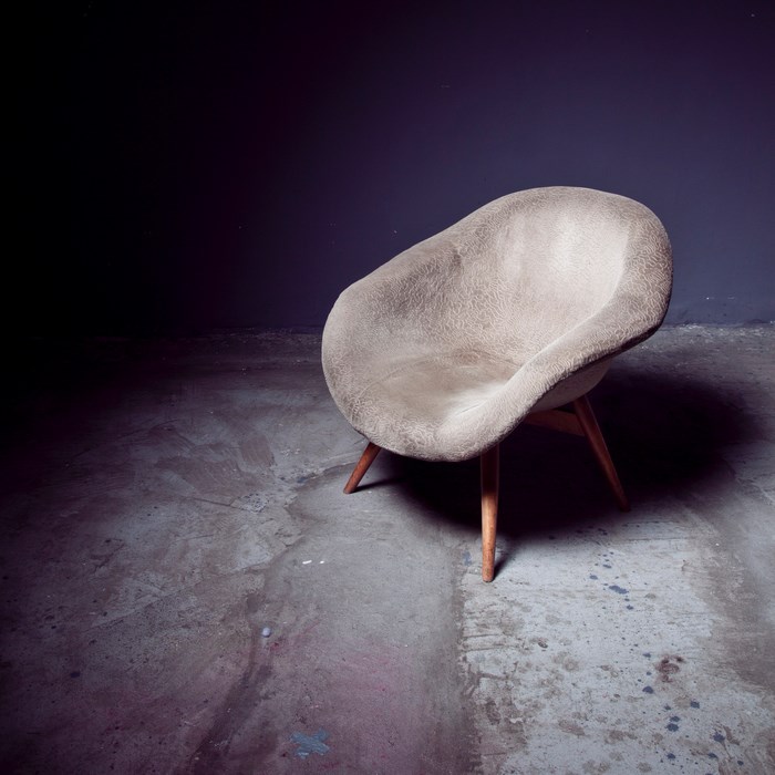 Vintage armchair in an abandoned room