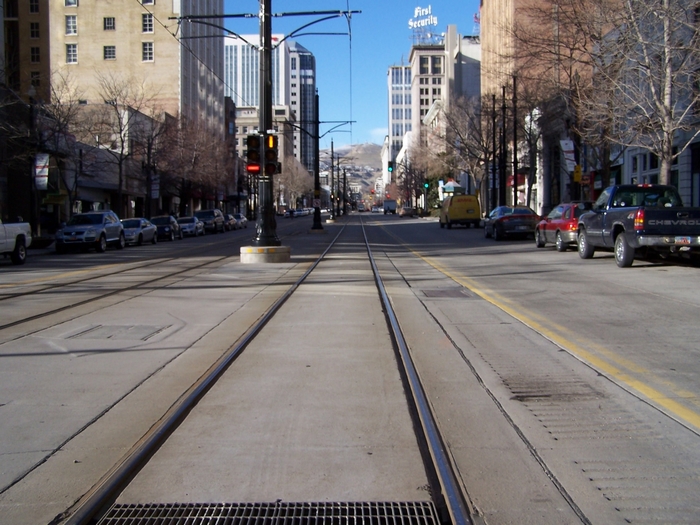City street with tram tracks and buildings