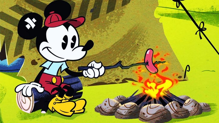 Mickey Mouse roasting a sausage over a campfire