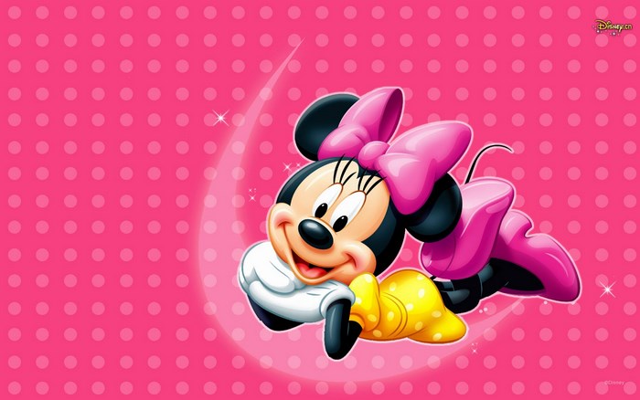 Minnie Mouse on a pink polka dot background