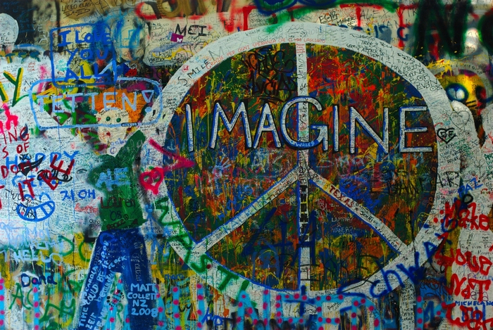 Peace sign with "Imagine" text and graffiti