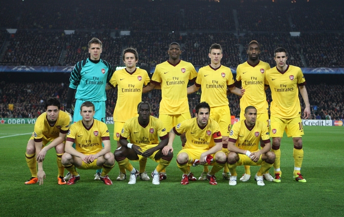 Arsenal FC football team posing for a photo