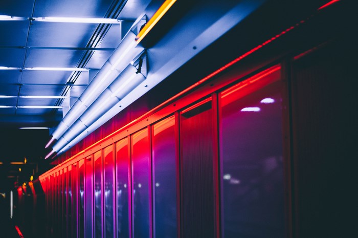 Urban tunnel with blue and red neon lights