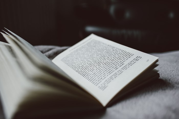Open book with text on pages