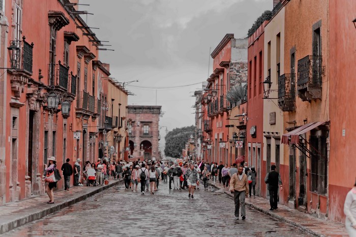 Street scene in San Miguel de Allende, Mexico with people walking