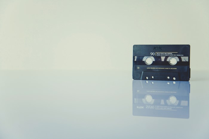 Black XIM 90 Cassette Tape with Reflection