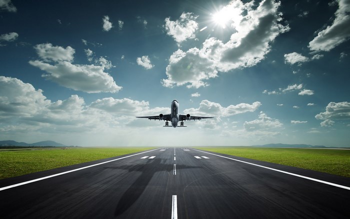 Airplane taking off from runway