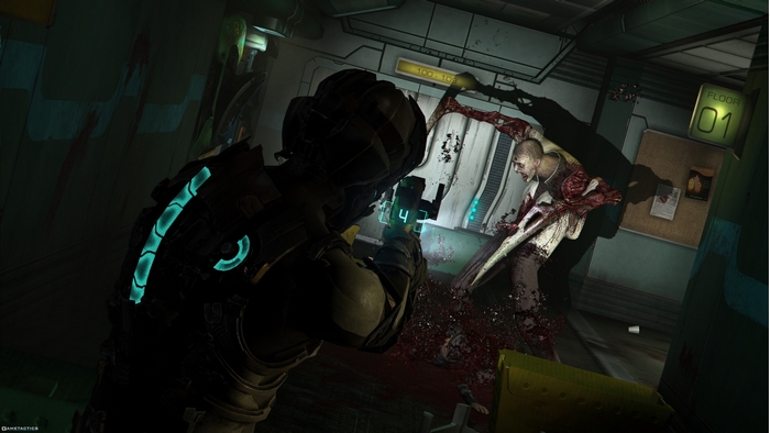 Isaac Clarke fighting a Necromorph in Dead Space