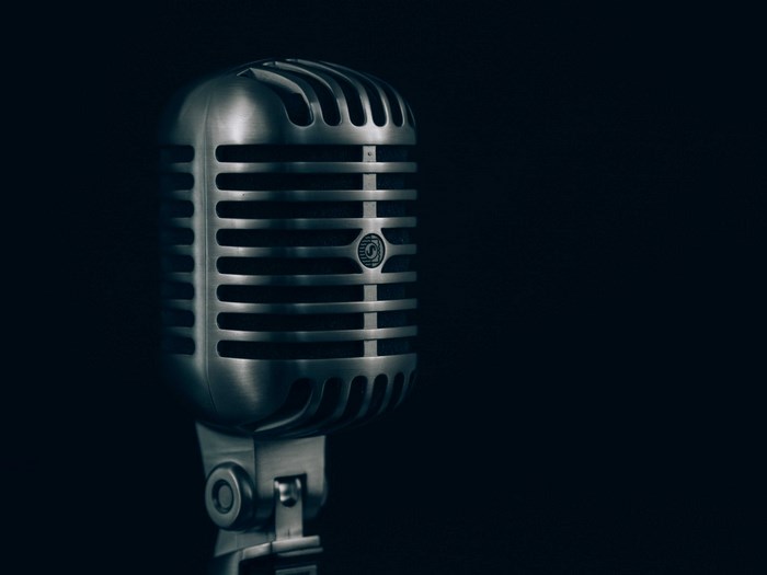 Vintage microphone on a black background