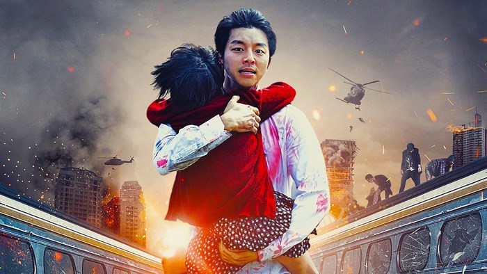 Man carrying a child on a train during a zombie apocalypse