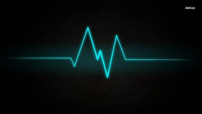 Cyan heartbeat wave on black background
