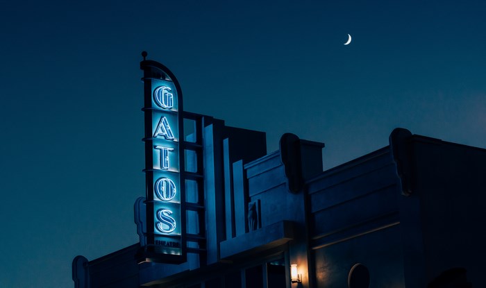 Los Gatos Theatre sign at night with moon