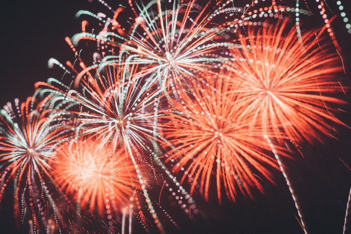 Fireworks exploding in the night sky over Hong Kong