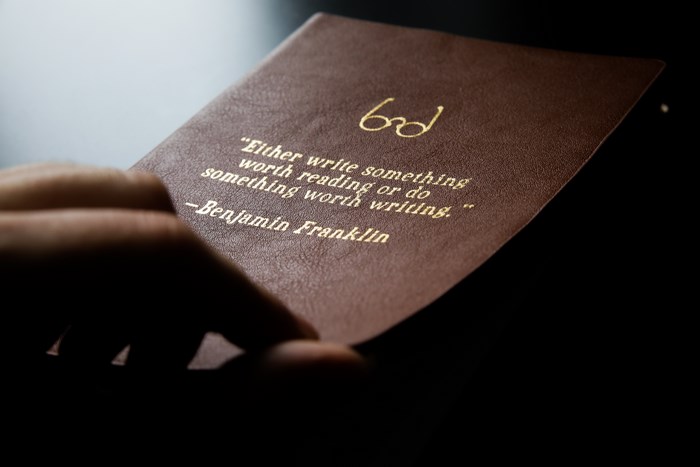 Benjamin Franklin quote on a leather notebook
