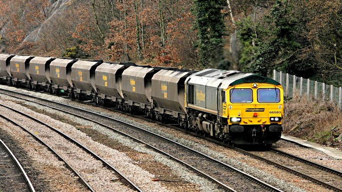 Freightliner Class 66 locomotive pulling coal wagons