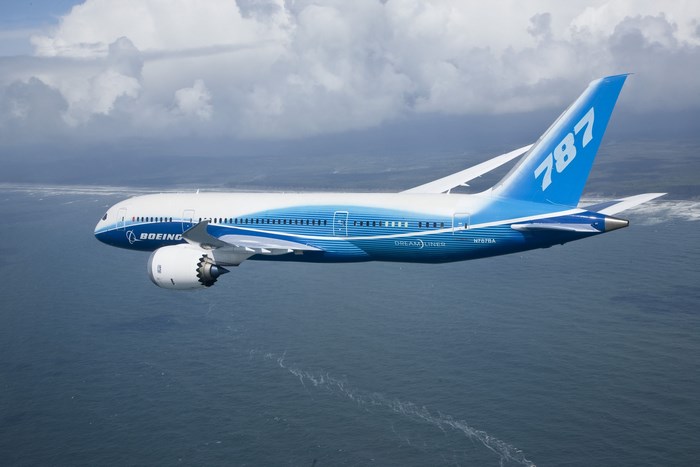 Boeing 787 Dreamliner flying over the ocean