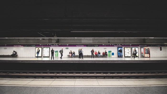 People waiting at Sagrada Familia metro station platform