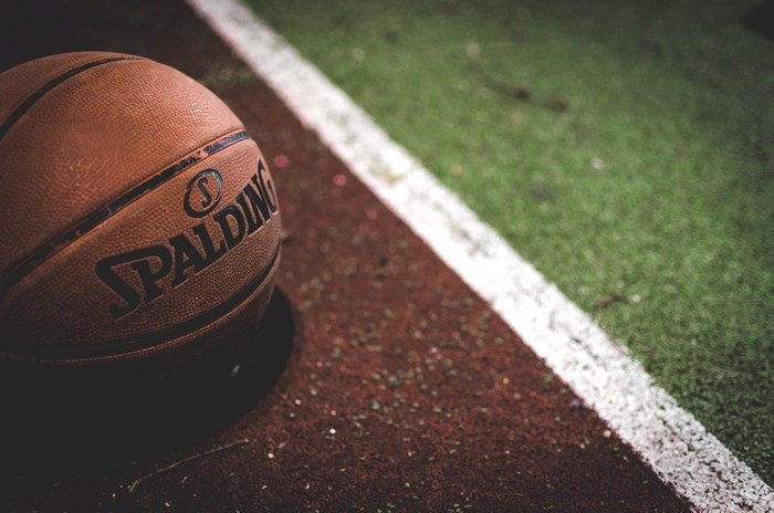 Spalding Basketball on a Court with White Line