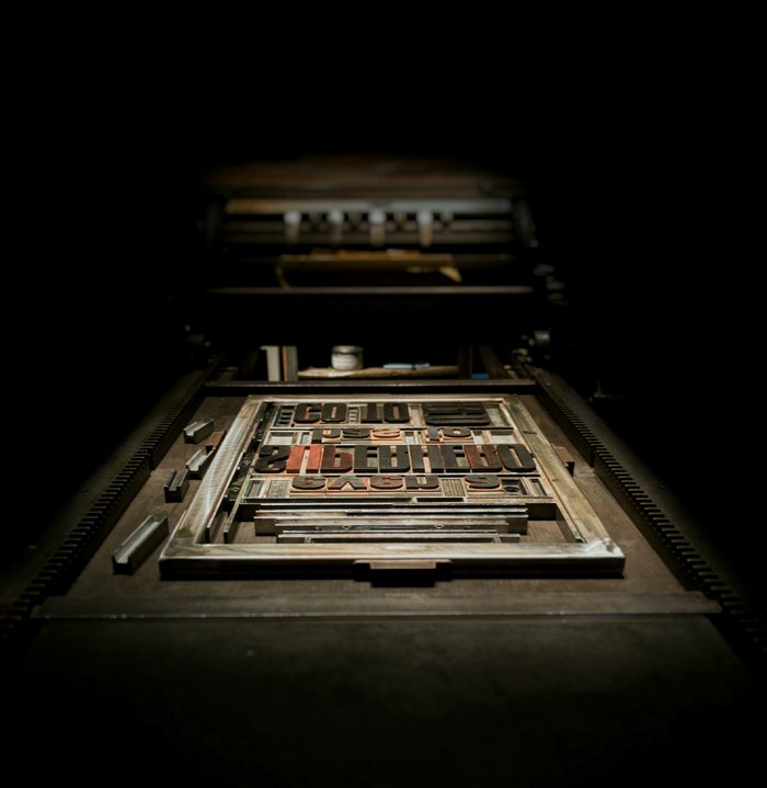 Letterpress printing equipment with typeset text