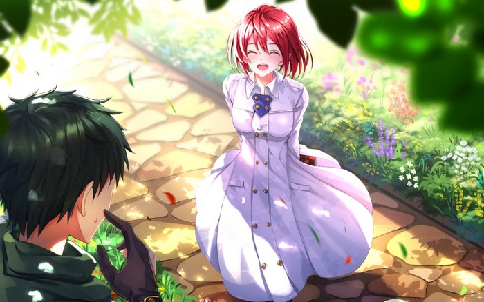 Girl with red hair and boy in garden