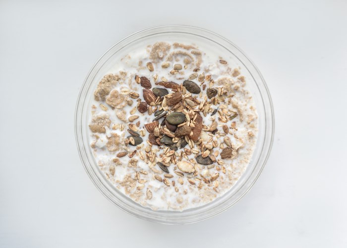 Bowl of Muesli with Milk and Nuts