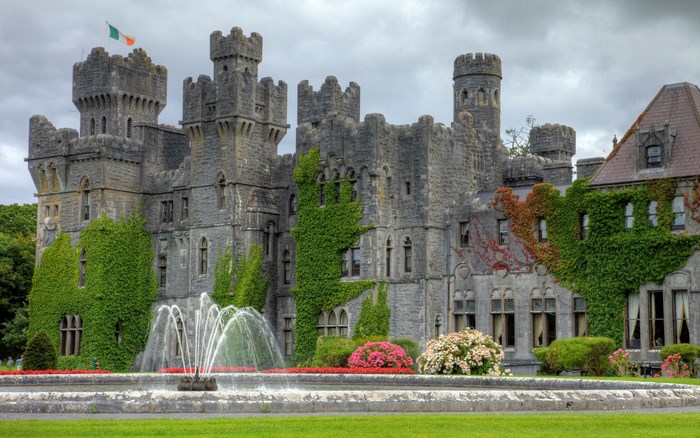 Ashford Castle with fountain and Irish flag