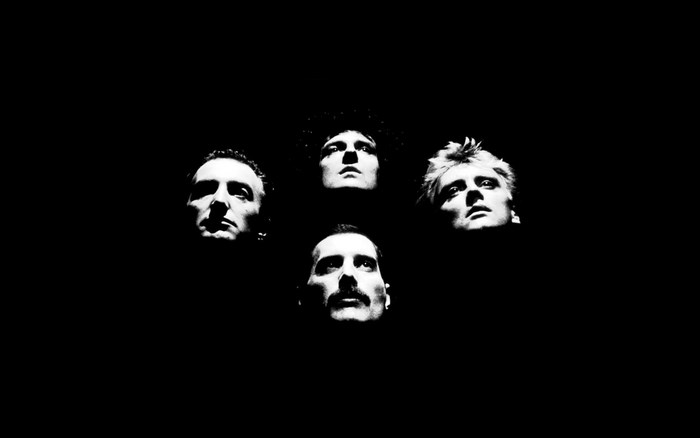 Queen band members faces in black and white