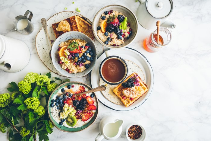 Colorful Healthy Brunch with Fresh Fruit and Coffee