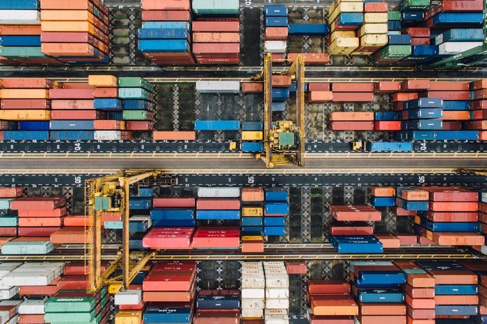 Aerial view of a colorful shipping container yard