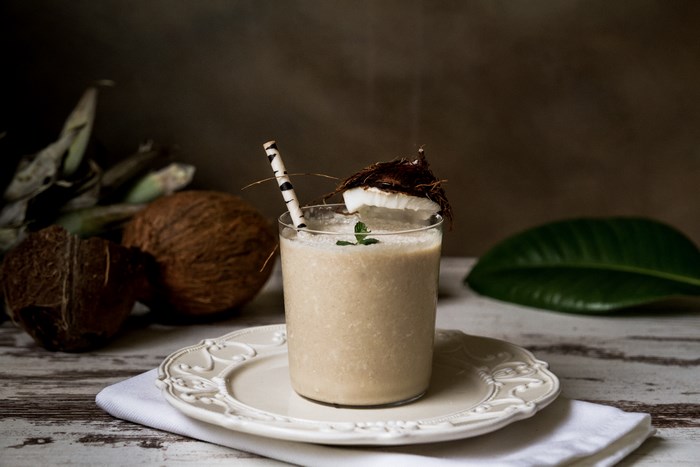 Coconut smoothie with fresh coconuts and mint