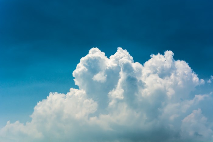 White clouds against a blue sky