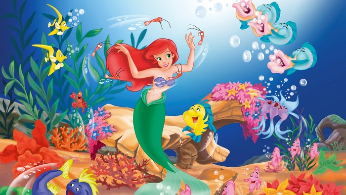 Ariel from The Little Mermaid underwater with Flounder and friends