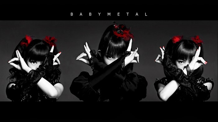 BABYMETAL members posing with hands in front of faces