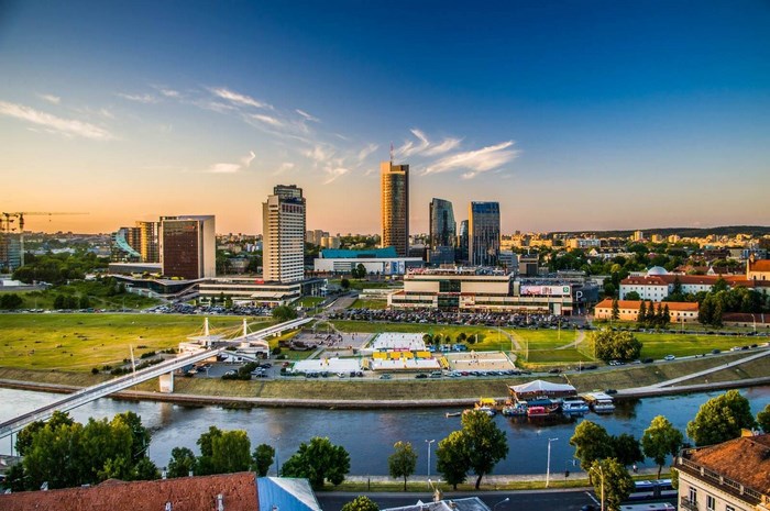 Vilnius cityscape with river and modern buildings