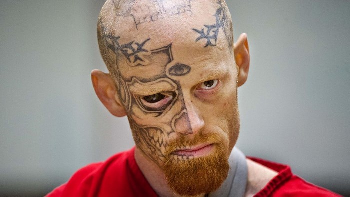 Jason Barnum with skull face tattoo