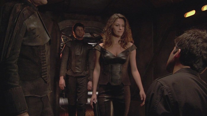Stargate Atlantis characters in a corridor