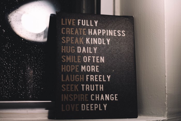 Inspirational Quotes on a Dark Notebook