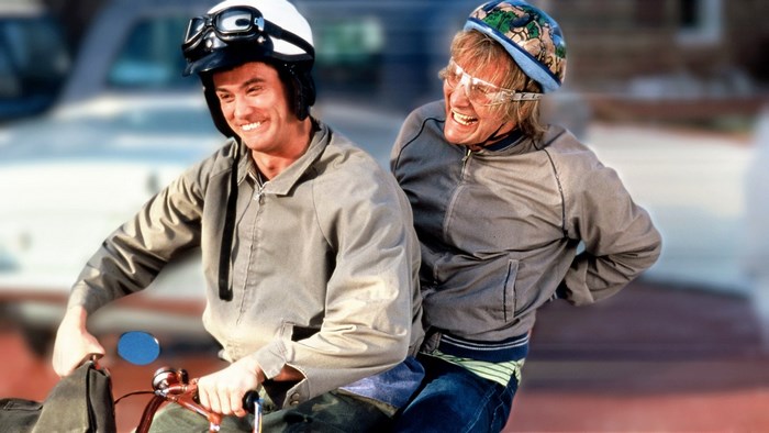 Lloyd and Harry from Dumb and Dumber on a scooter